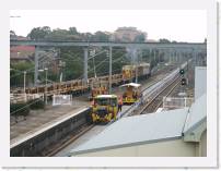 pict4526 * Carlton Station - A rail train is passing. The spot tamper and what I know know is a pandrol clip inserting machine are at the Alawah end of the platform. * 2560 x 1920 * (2.15MB)