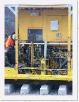 pict4534 * Carlton station - Closer view of the mechanics of the pandrol placer and inserter. * 1920 x 2560 * (861KB)