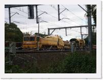 pict4541 * Between Kogarah and Carlton. The machine is 'cut out' and sitting on it's rail wheels, but still 'creeping' forward so the pandrol clip placers and lay out the clips. * 2560 x 1920 * (2.35MB)